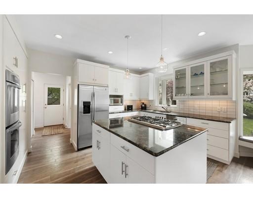 9 Elizabeth Road Marblehead, MA 01945 - Photo 7 of 30 a kitchen with stainless steel appliances granite countertop a stove and a refrigerator