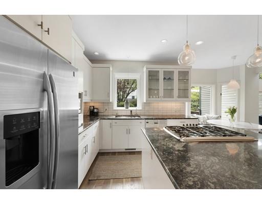 9 Elizabeth Road Marblehead, MA 01945 - Photo 8 of 30 a kitchen with stainless steel appliances granite countertop a stove a sink dishwasher and a refrigerator