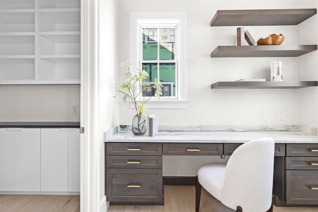 8 Common Court Lexington, MA 02421 - Photo 6 of 18 a kitchen with a sink a window and cabinets