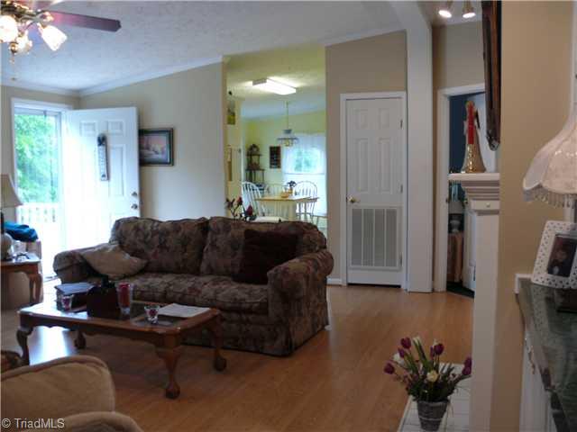4283 Waynick Meadow Road Asheboro, NC 27205 - Photo 5 of 11 Living Room. Living room and kitchen has cathedral ceilings