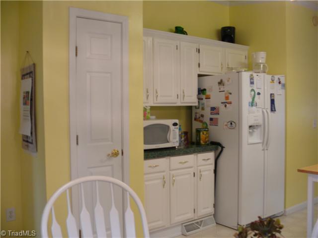4283 Waynick Meadow Road Asheboro, NC 27205 - Photo 8 of 11 Kitchen. Refrigerator remains also along with washer and dryer