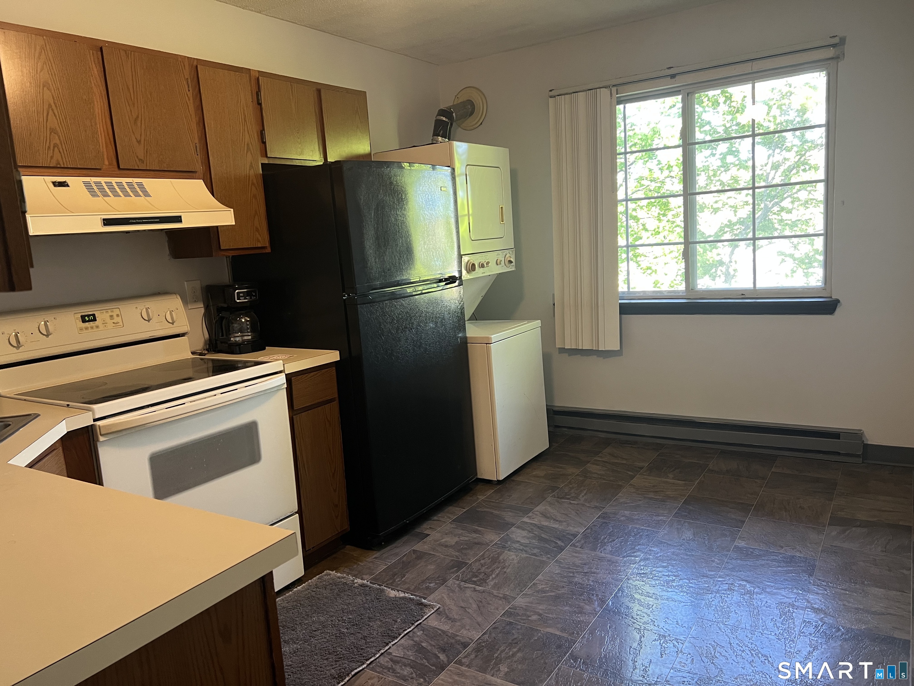 35 Mountain Village Road, Unit 30 Waterbury, CT 06706 - Photo 9 of 15 Other view of kitchen.