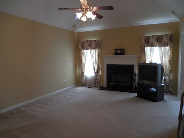 1325 Bates Road Lebanon, TN 37087 - Photo 4 of 20 FORMAL LIVING ROOM WITH WOODBURING FIREPLACE, MANTLE, RECESSED LIGHTING, AND SOARING CEILING