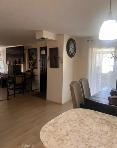 a view of a livingroom with furniture and window