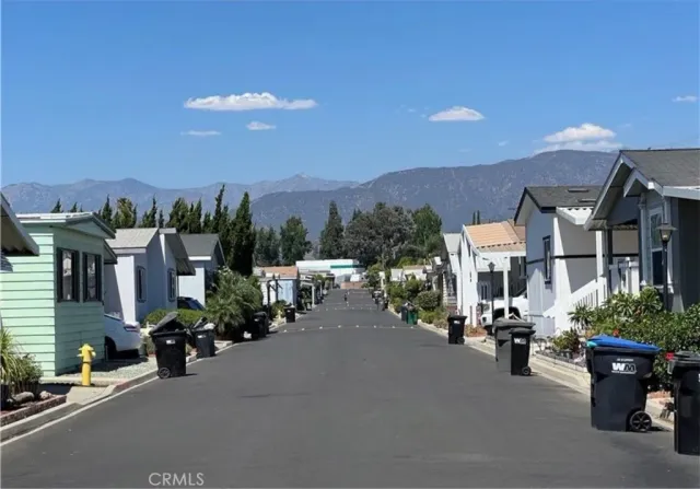 a view of a street with cars