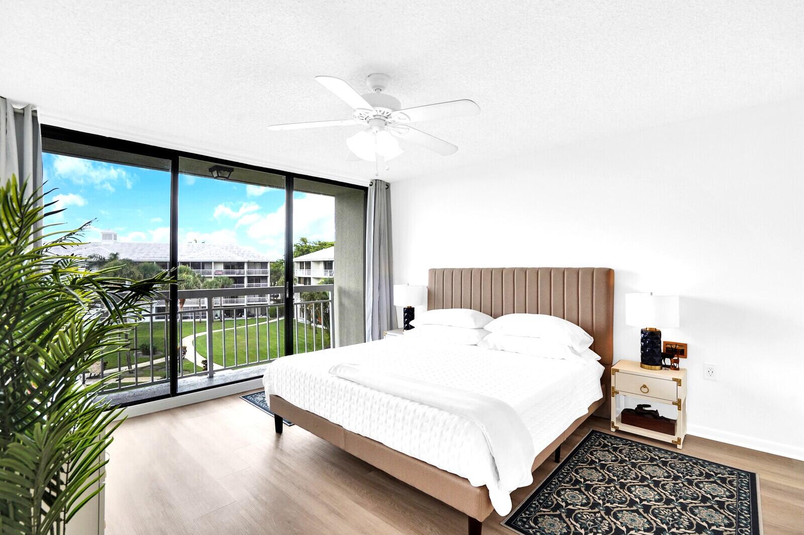 2601 Village Boulevard, Unit 404 West Palm Beach, FL 33409 - Photo 19 of 39 Master Bedroom Balcony
