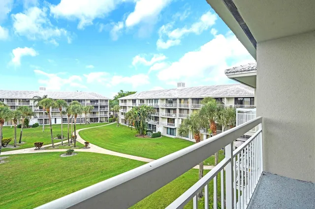 a view of a garden from a balcony
