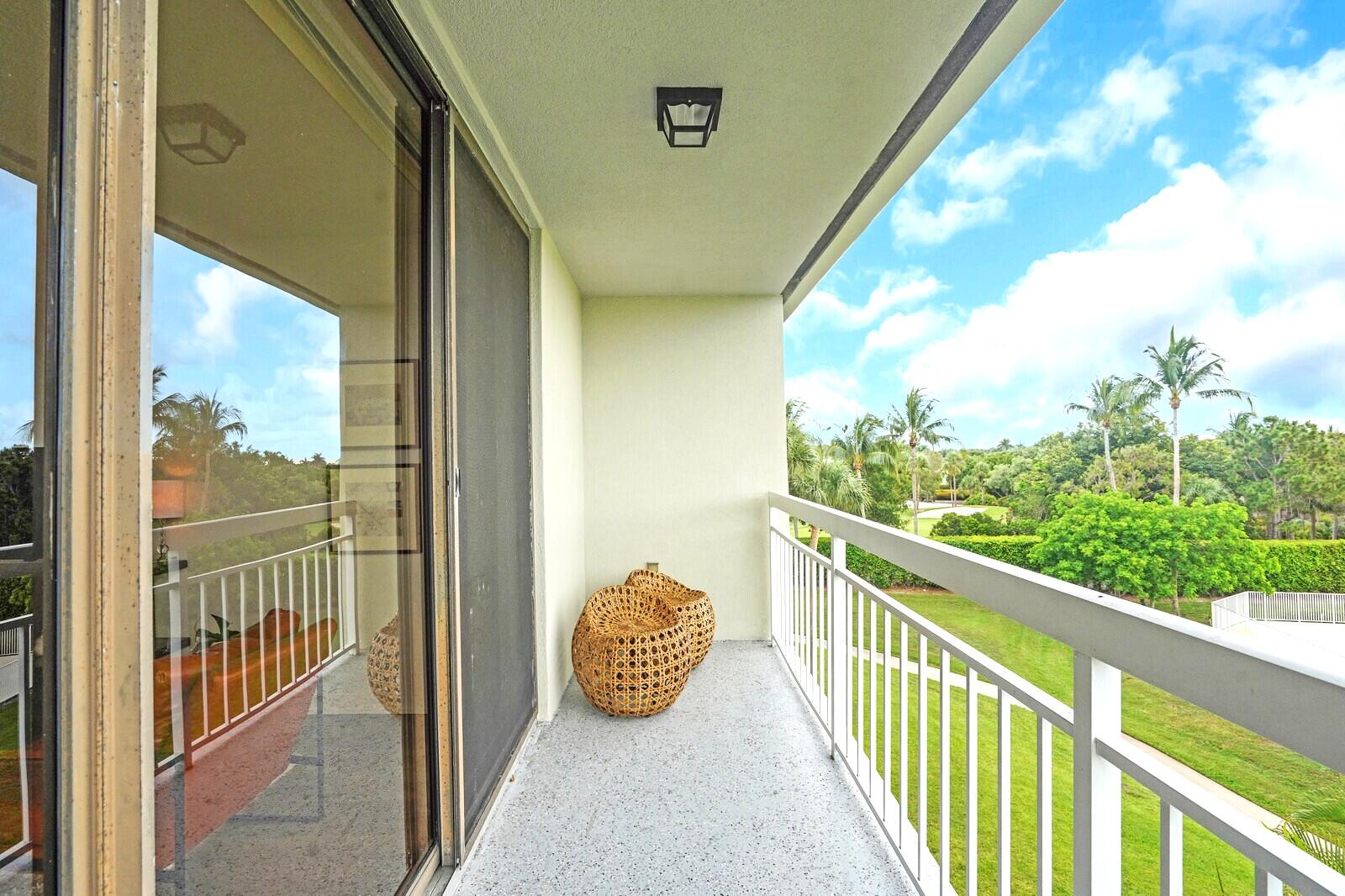 2601 Village Boulevard, Unit 404 West Palm Beach, FL 33409 - Photo 28 of 39 Lake and Golf Views