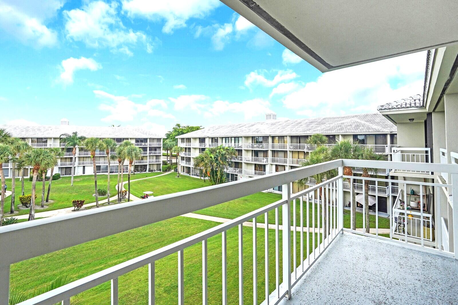 2601 Village Boulevard, Unit 404 West Palm Beach, FL 33409 - Photo 29 of 39 Pool Views