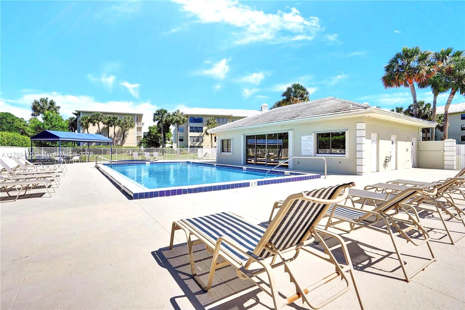 2601 Village Boulevard, Unit 404 West Palm Beach, FL 33409 - Photo 36 of 39 Pool area