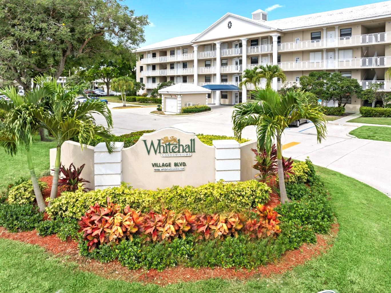 2601 Village Boulevard, Unit 404 West Palm Beach, FL 33409 - Photo 37 of 39 Whitehall Entrance