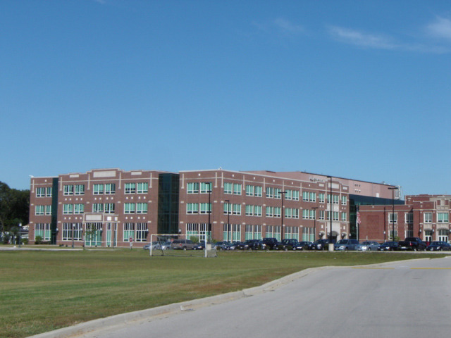 916 Spring Road Elmhurst, IL 60126 - Photo 4 of 7 a view of a big building with a big yard and large trees