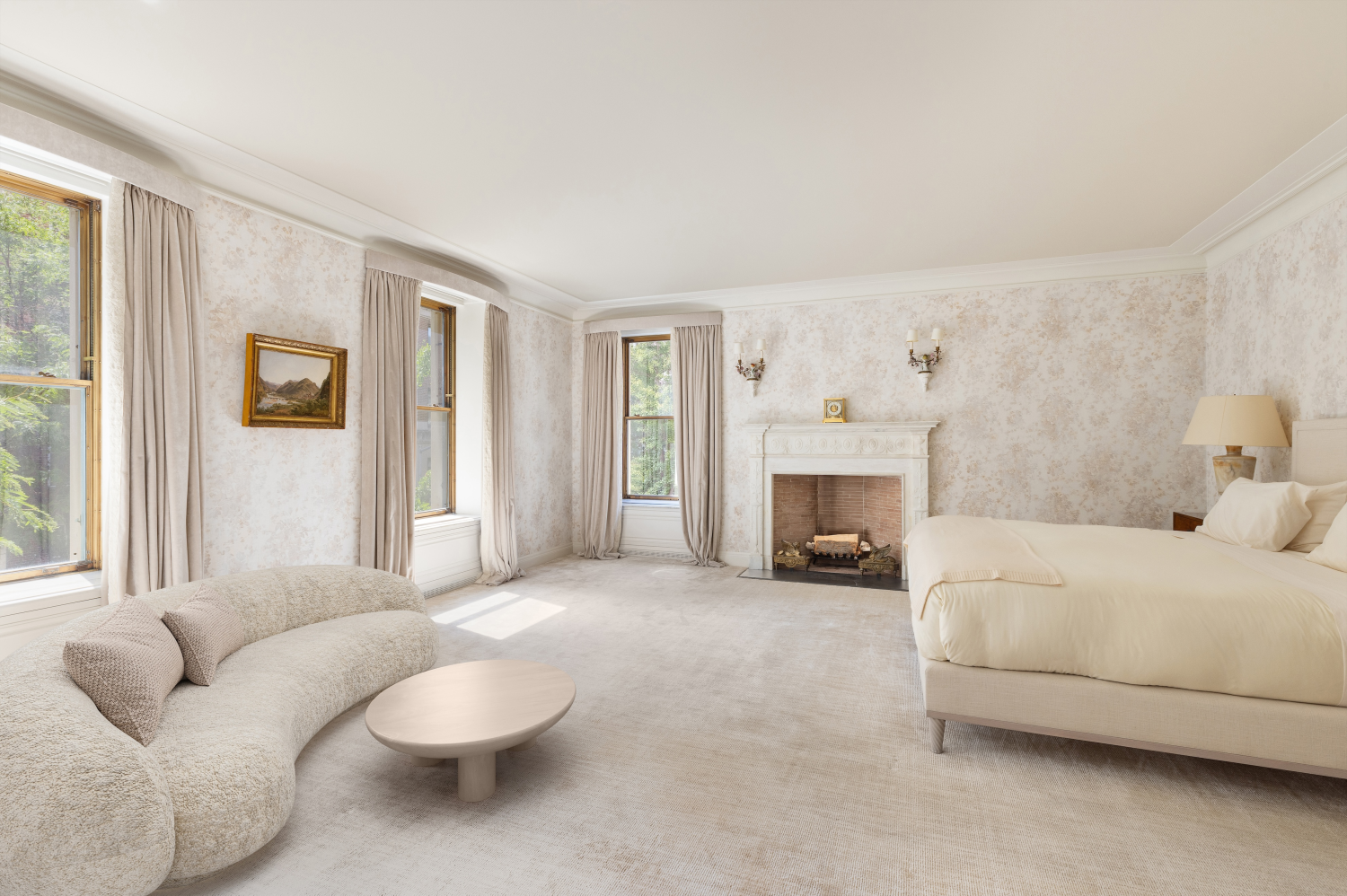 740 Park Avenue, Unit 2/3D Manhattan, NY 10021 - Photo 12 of 24 a spacious bedroom with a bed and a fireplace