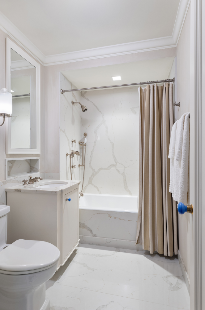 740 Park Avenue, Unit 2/3D Manhattan, NY 10021 - Photo 17 of 24 a bathroom with a sink toilet and a bathtub
