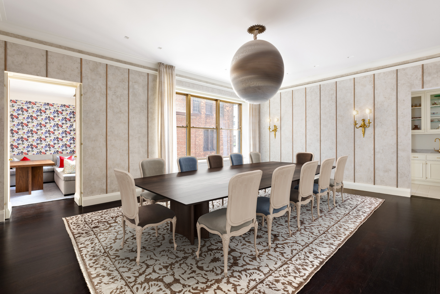 740 Park Avenue, Unit 2/3D Manhattan, NY 10021 - Photo 8 of 24 a view of a dining room with furniture and wooden floor