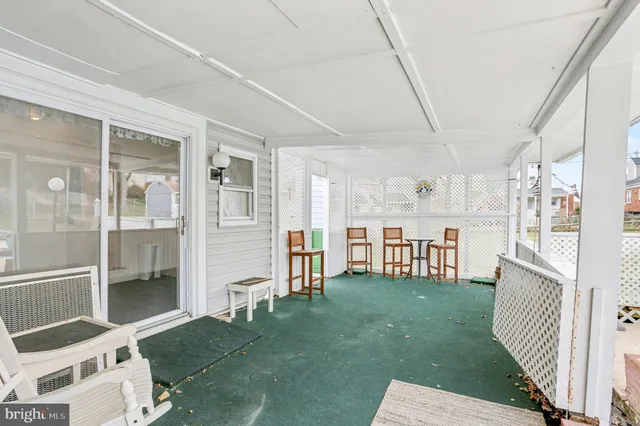 a kitchen with granite countertop a stove and a refrigerator
