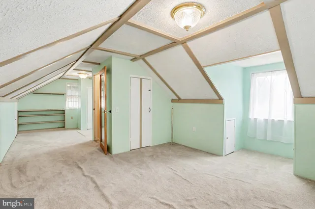 a view of a room with an entryway