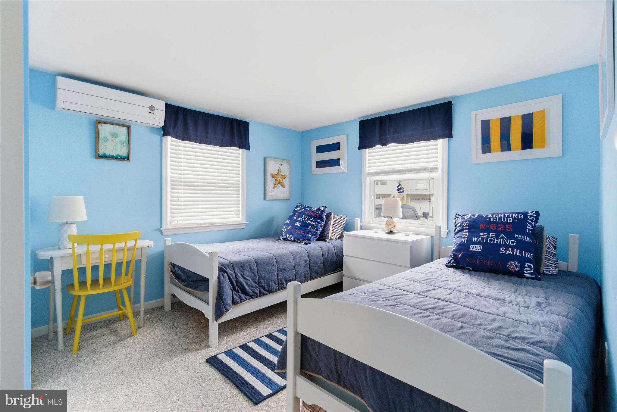2 West Janet Road, Unit 1 Long Beach Township, NJ 08008 - Photo 19 of 36 a bedroom with two beds and window