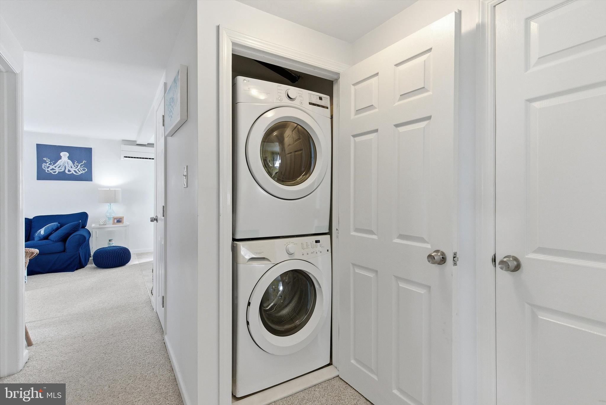 2 West Janet Road, Unit 1 Long Beach Township, NJ 08008 - Photo 21 of 36 a view of a hallway with washer and dryer