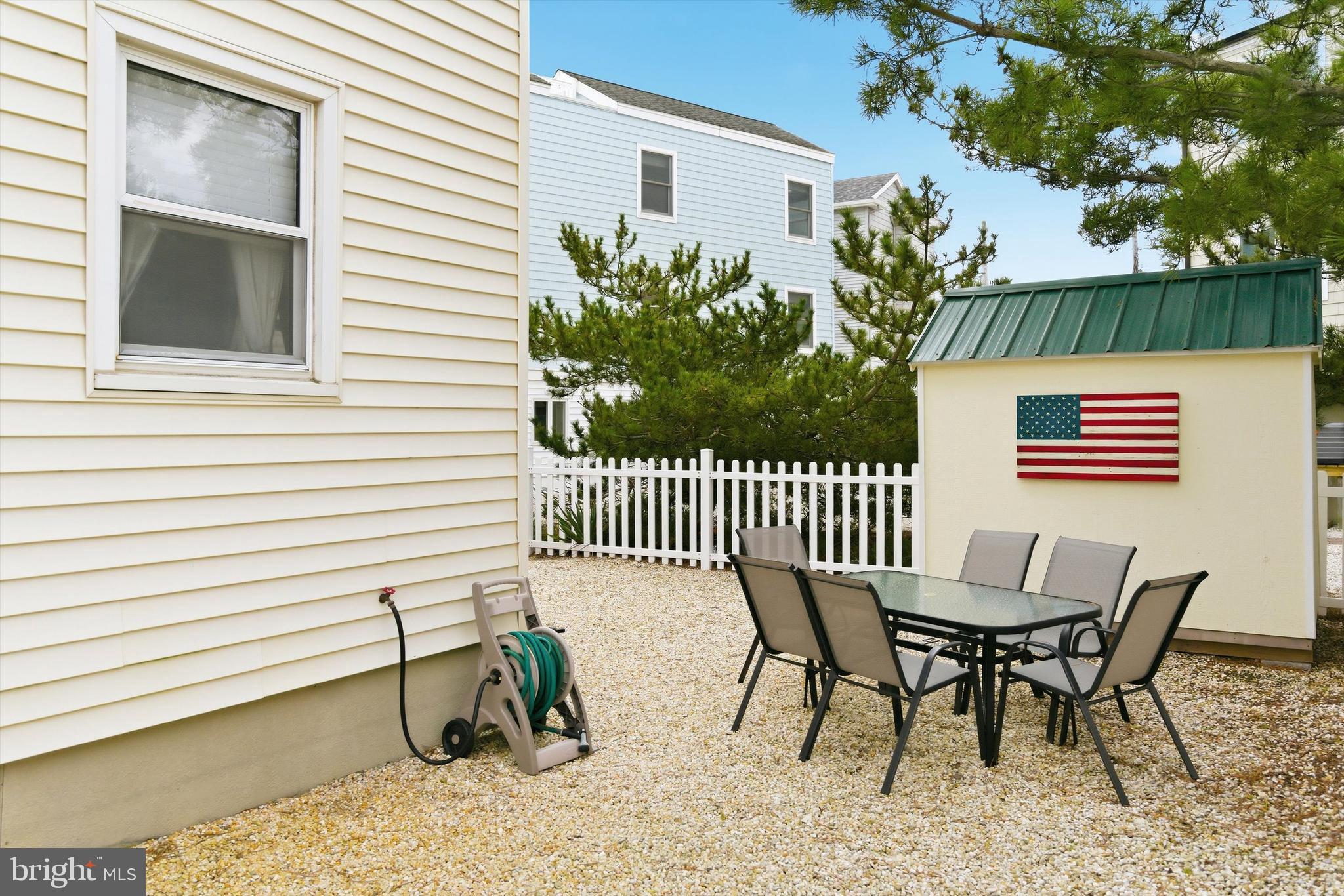 2 West Janet Road, Unit 1 Long Beach Township, NJ 08008 - Photo 25 of 36 a view of a chair and table in the balcony