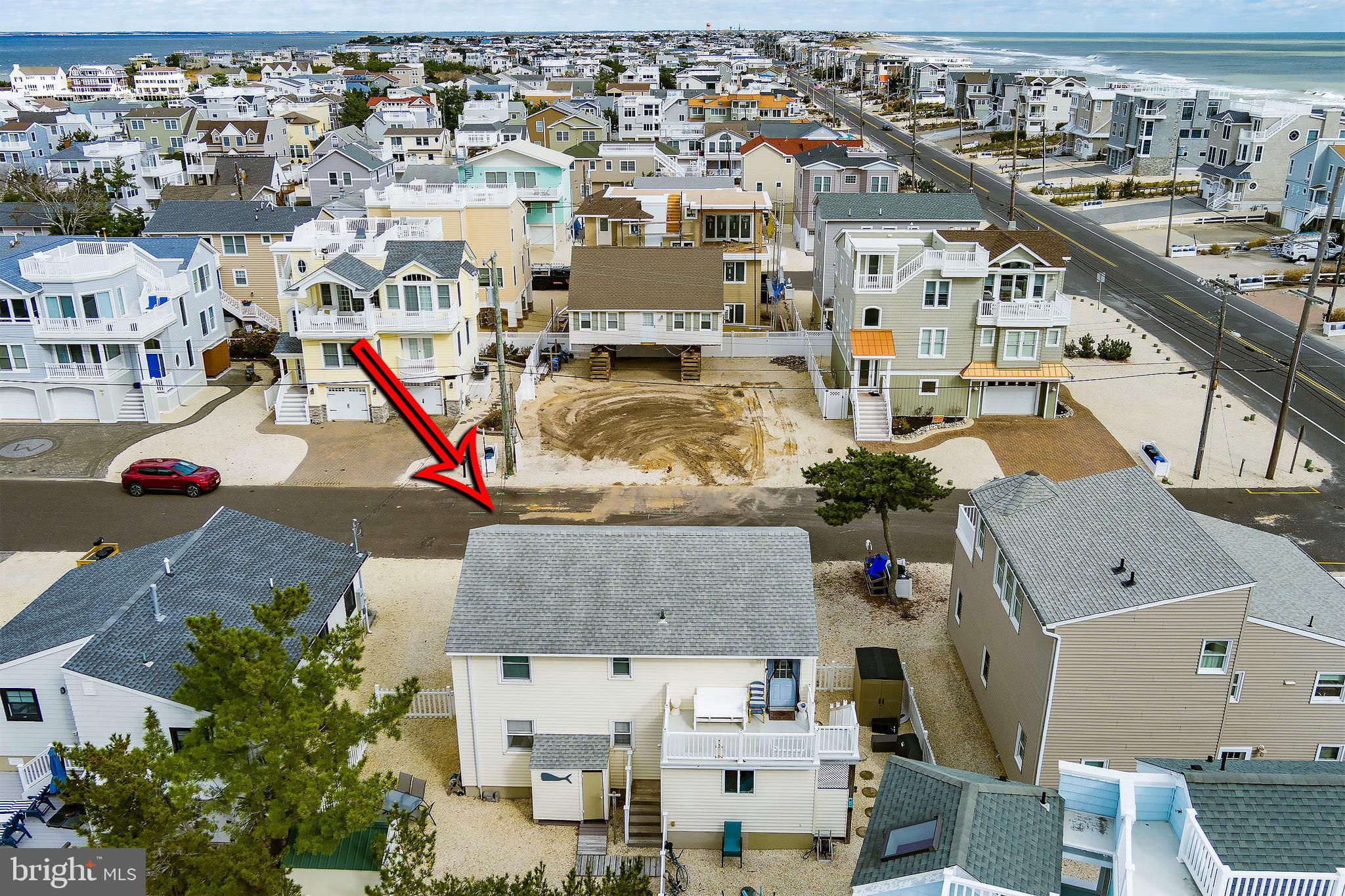 2 West Janet Road, Unit 1 Long Beach Township, NJ 08008 - Photo 26 of 36 an aerial view of multiple houses with outdoor space