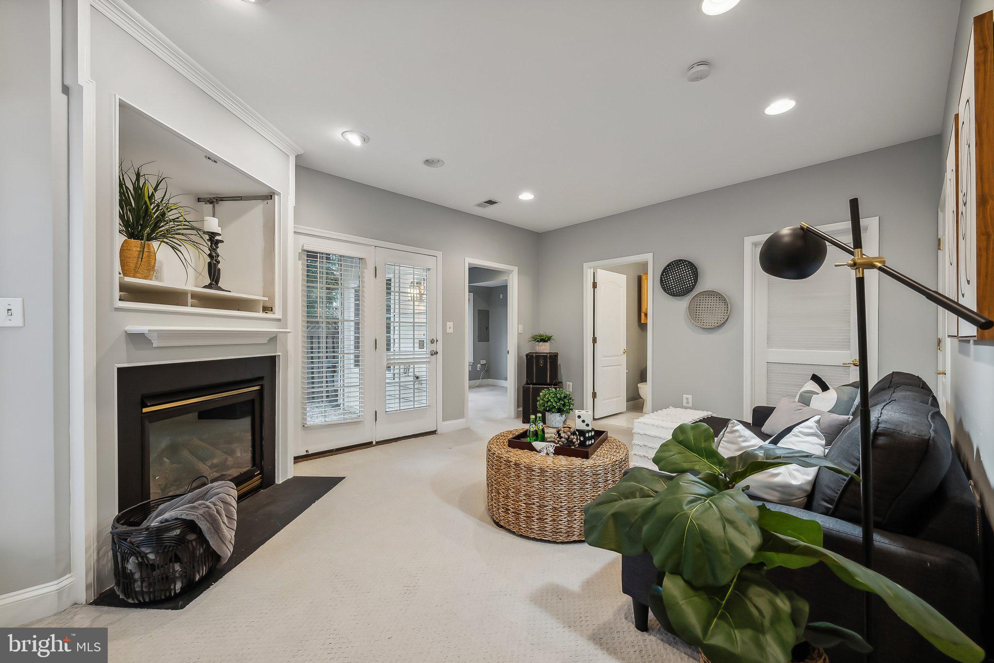 4237 Upper Park Drive Fairfax, VA 22030 - Photo 13 of 28 Lower level rec room with fireplace