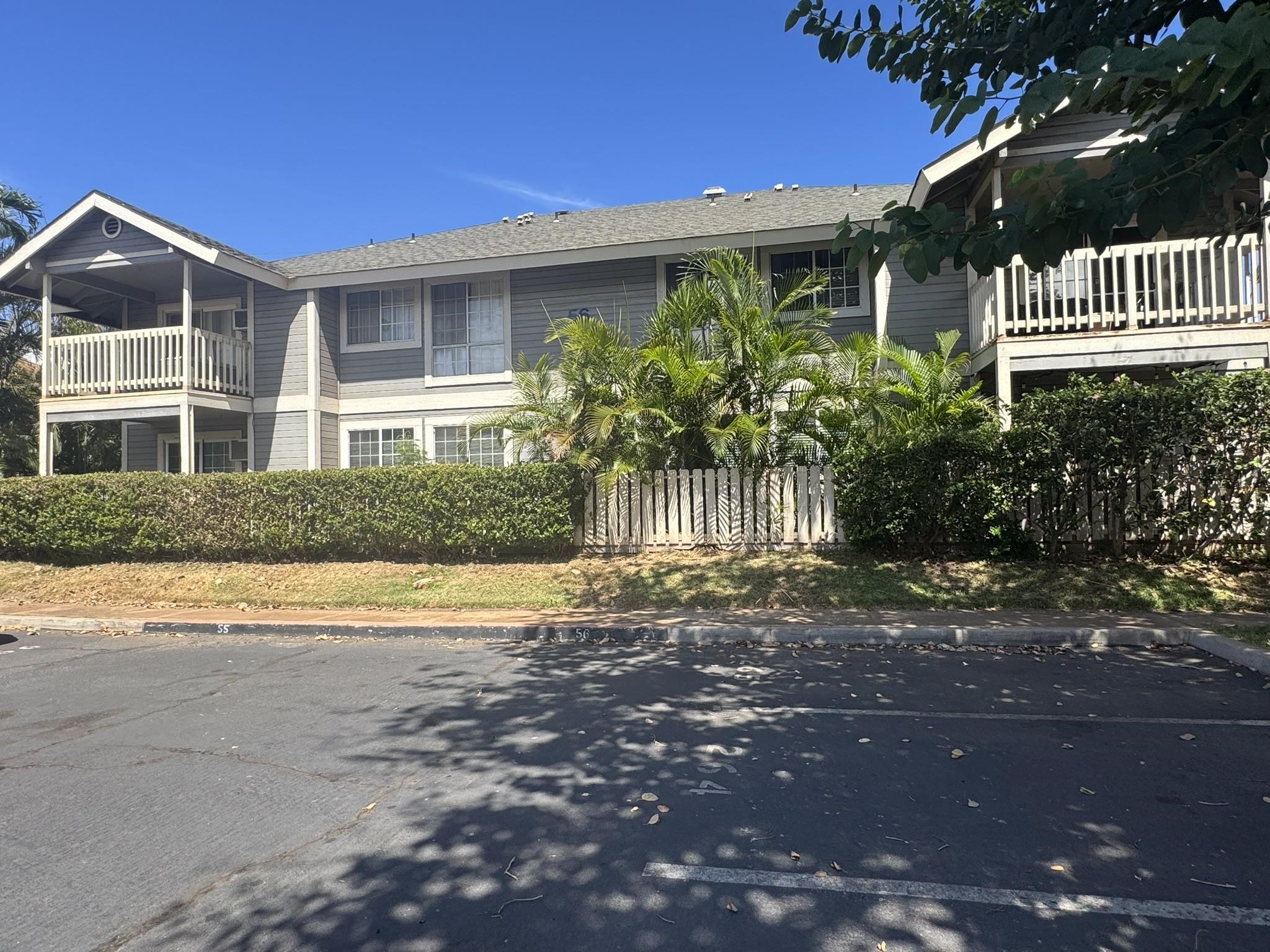 140 Uwapo Road, Unit 56204 Kihei, HI 96753 - Photo 33 of 40 a view of a house with a yard