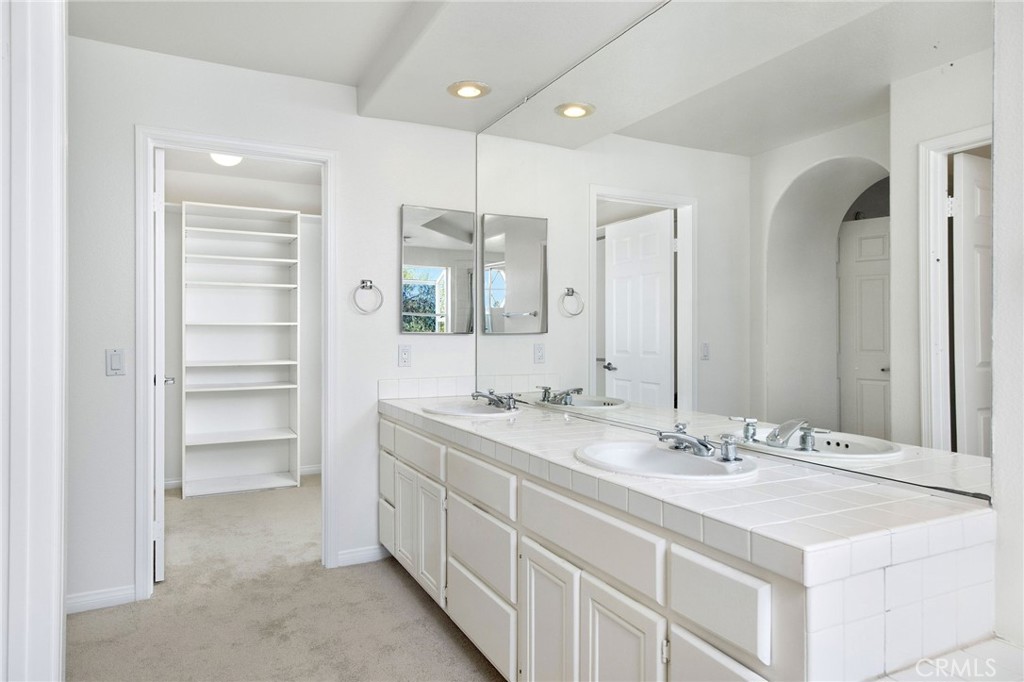33072 Ocean Ridge Dana Point, CA 92629 - Photo 15 of 26 a bathroom with a sink double vanity and a mirror