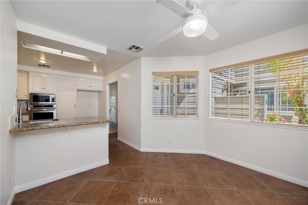 33072 Ocean Ridge Dana Point, CA 92629 - Photo 4 of 26 a view of a kitchen with furniture and a window
