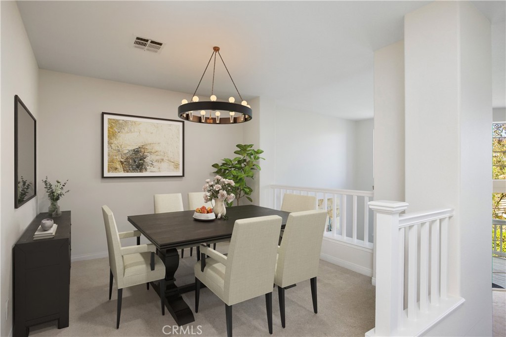 33072 Ocean Ridge Dana Point, CA 92629 - Photo 5 of 26 a view of a dining room with furniture window and wooden floor