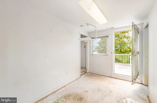 a view of a room with a large window