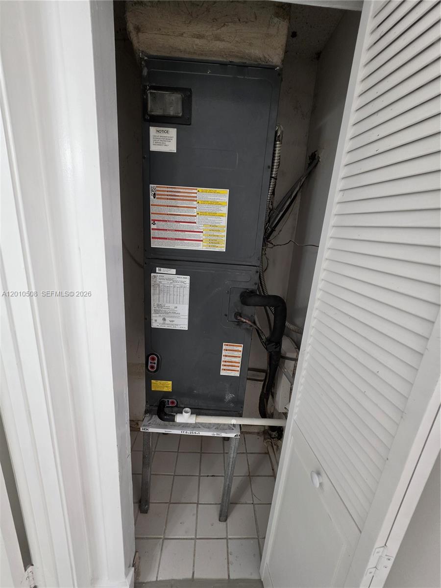 14775 Southwest 83rd Lane, Unit 14775 Miami, FL 33193 - Photo 7 of 26 a/c closet; a/c serviced