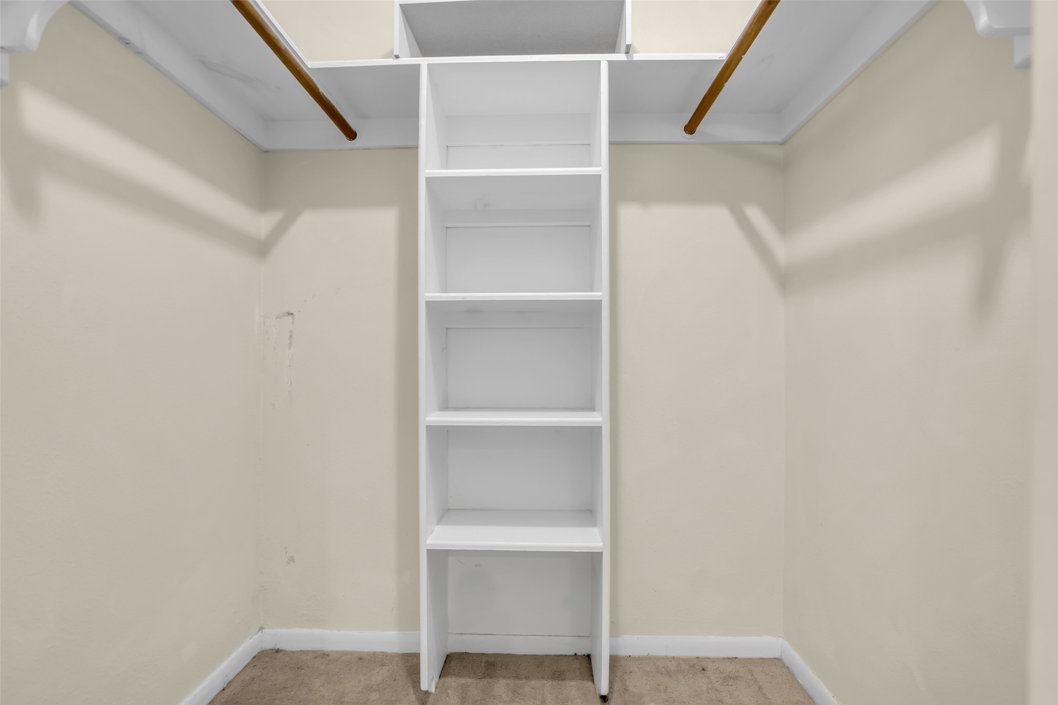 10002 Pinehurst Street Baytown, TX 77521 - Photo 16 of 17 a view of an empty walk in closet