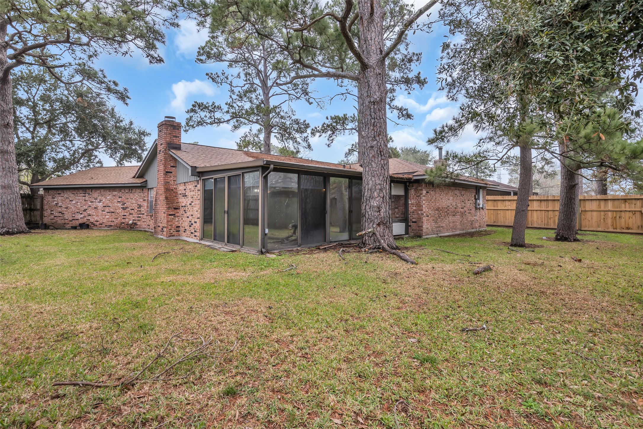 10002 Pinehurst Street Baytown, TX 77521 - Photo 17 of 17 front view of a house with a yard
