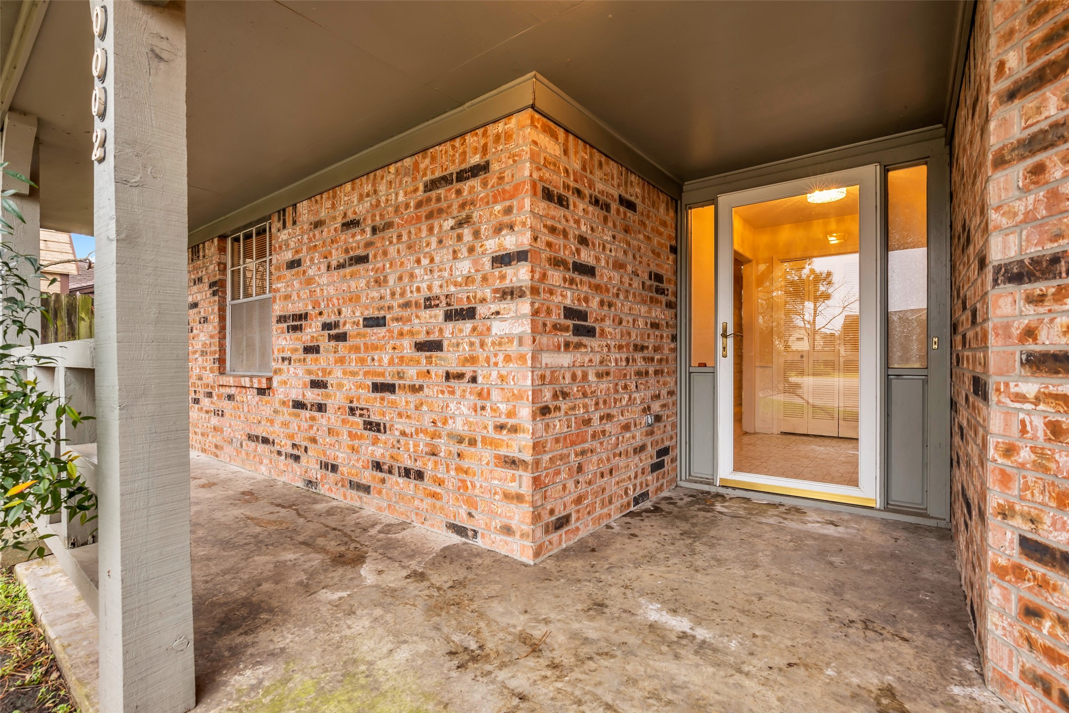 10002 Pinehurst Street Baytown, TX 77521 - Photo 4 of 17 a view of empty room with windows
