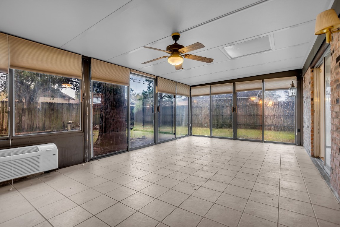 10002 Pinehurst Street Baytown, TX 77521 - Photo 9 of 17 a view of an entryway with a livingroom