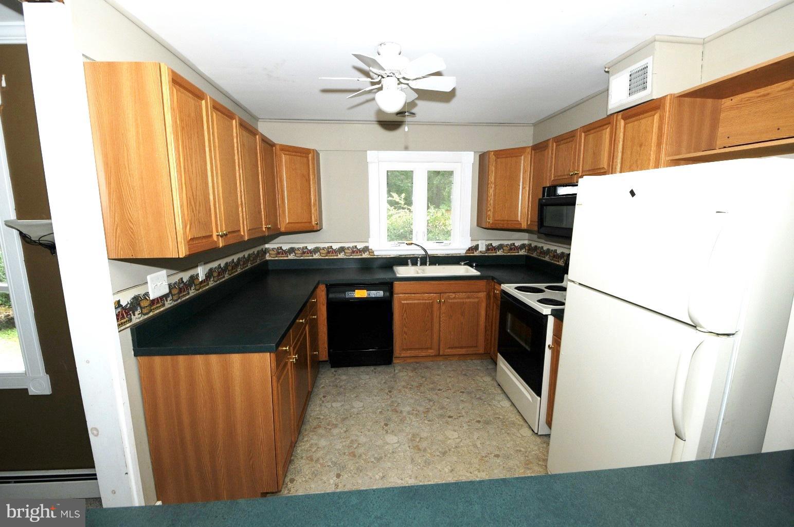 8334 Woodland Road Pasadena, MD 21122 - Photo 6 of 26 Kitchen