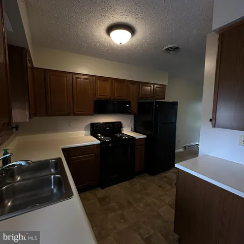 a front view of house with yard