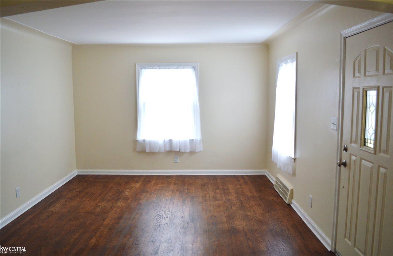 1738 Harvard Road Berkley, MI 48072 - Photo 3 of 31 Spacious family room with hardwood floors