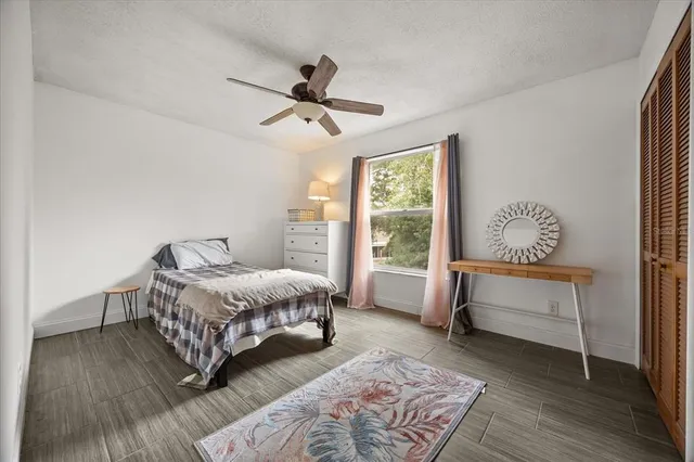 a room with a bed and a window