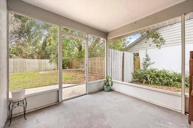 a swimming pool with wooden fence