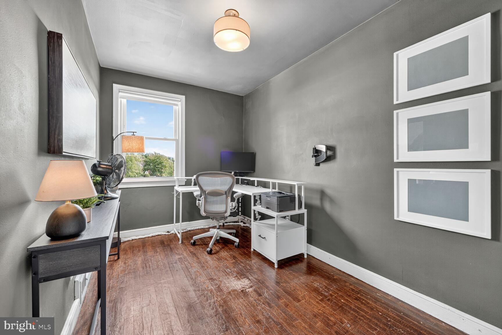 3910 R Street Southeast Washington, DC 20020 - Photo 11 of 24 Modern workspace with natural light.