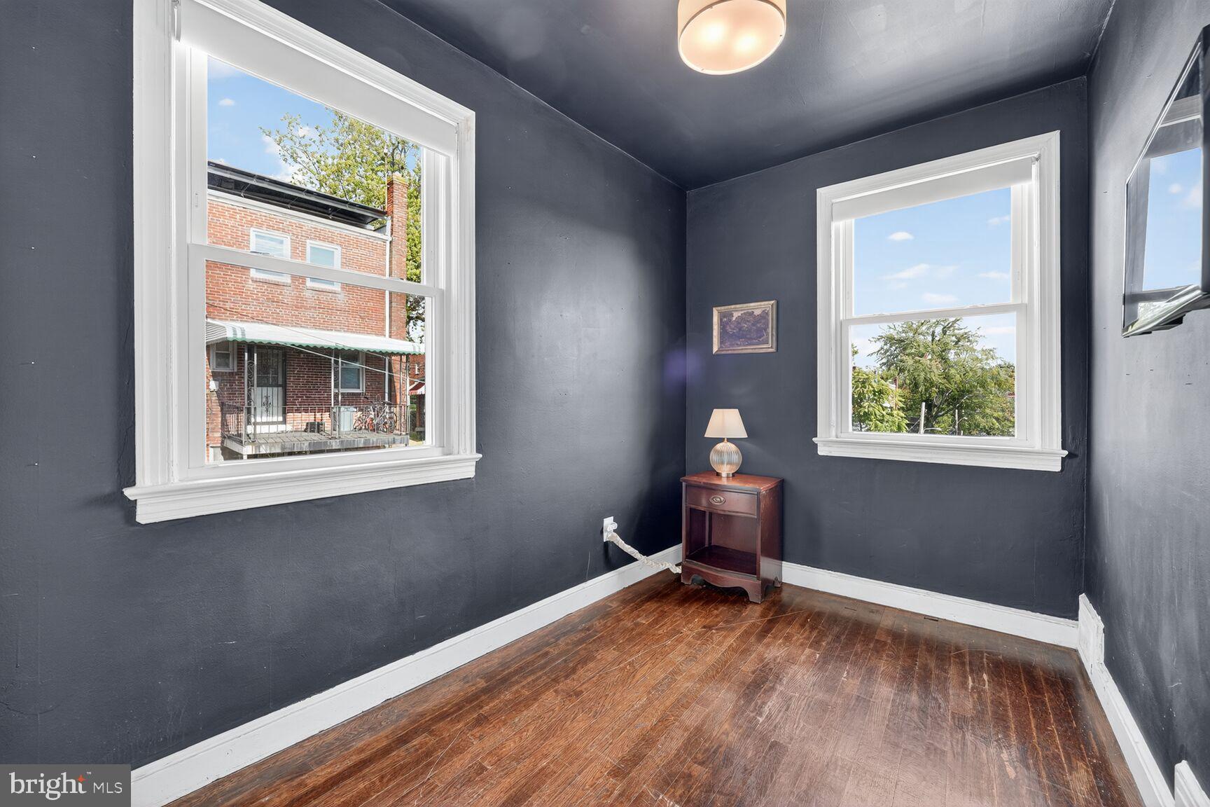 3910 R Street Southeast Washington, DC 20020 - Photo 13 of 24 Charming room with vibrant dark walls.