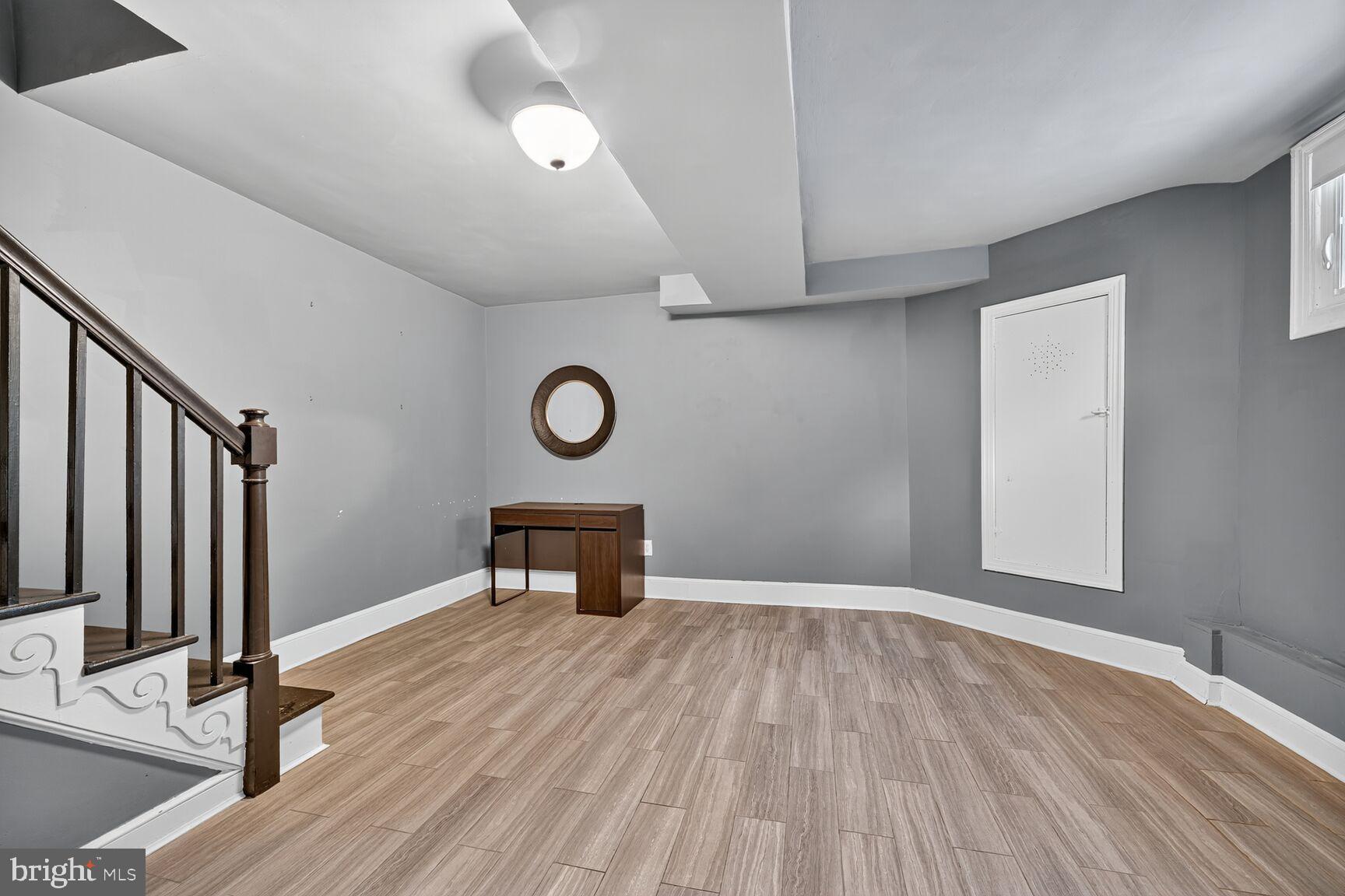 3910 R Street Southeast Washington, DC 20020 - Photo 17 of 24 Spacious, versatile room with modern charm.