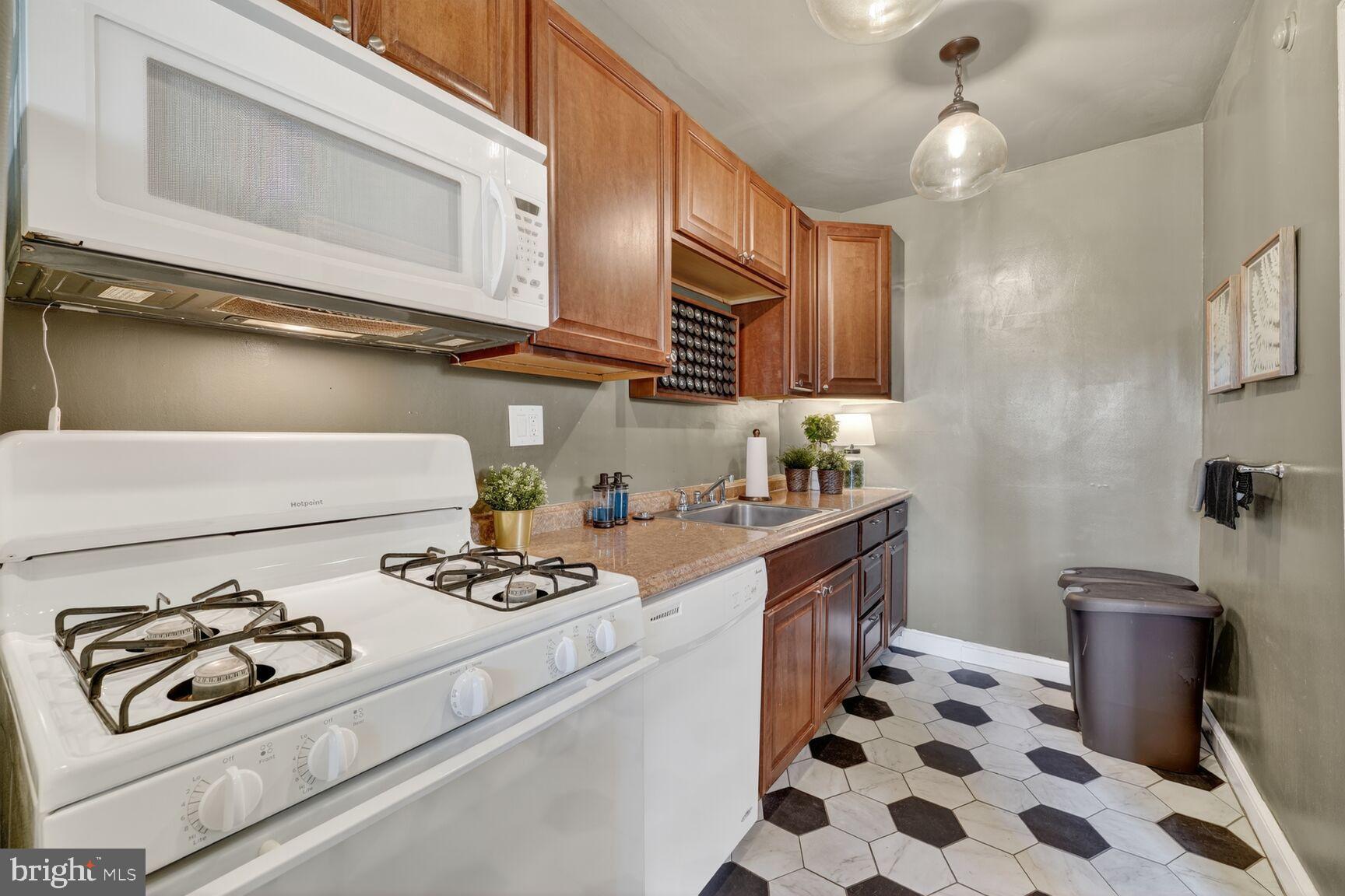 3910 R Street Southeast Washington, DC 20020 - Photo 8 of 24 Charming kitchen with modern touches.