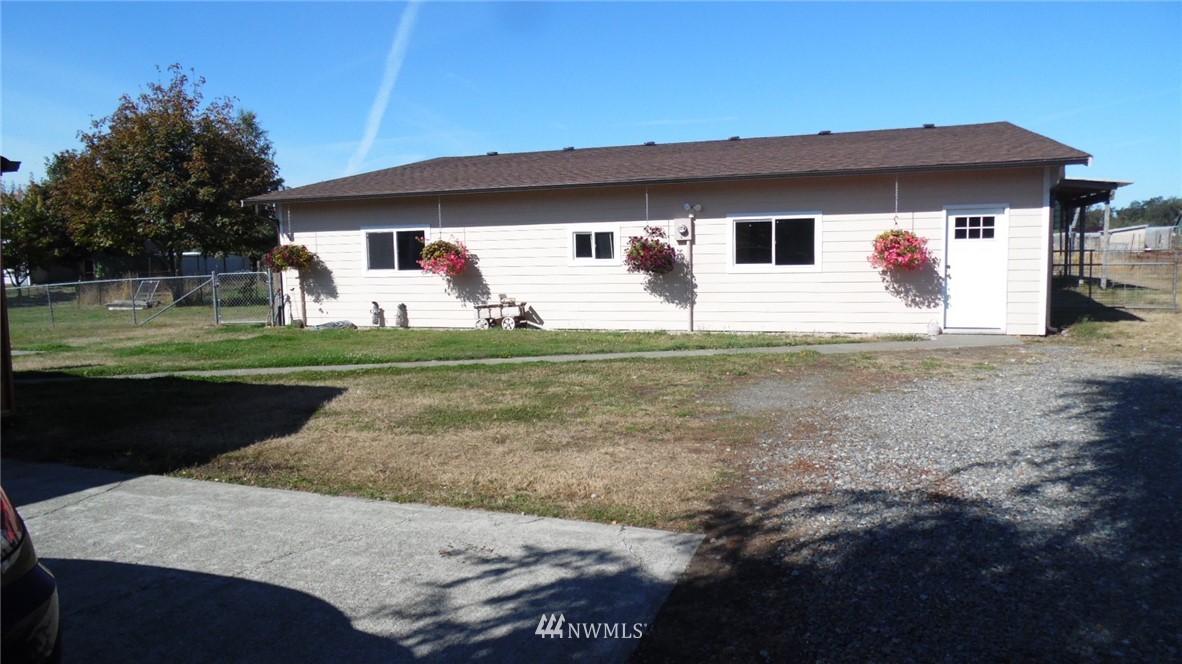 4538 180th Way Southwest Rochester, WA 98579 - Photo 15 of 25 a front view of a house with garden