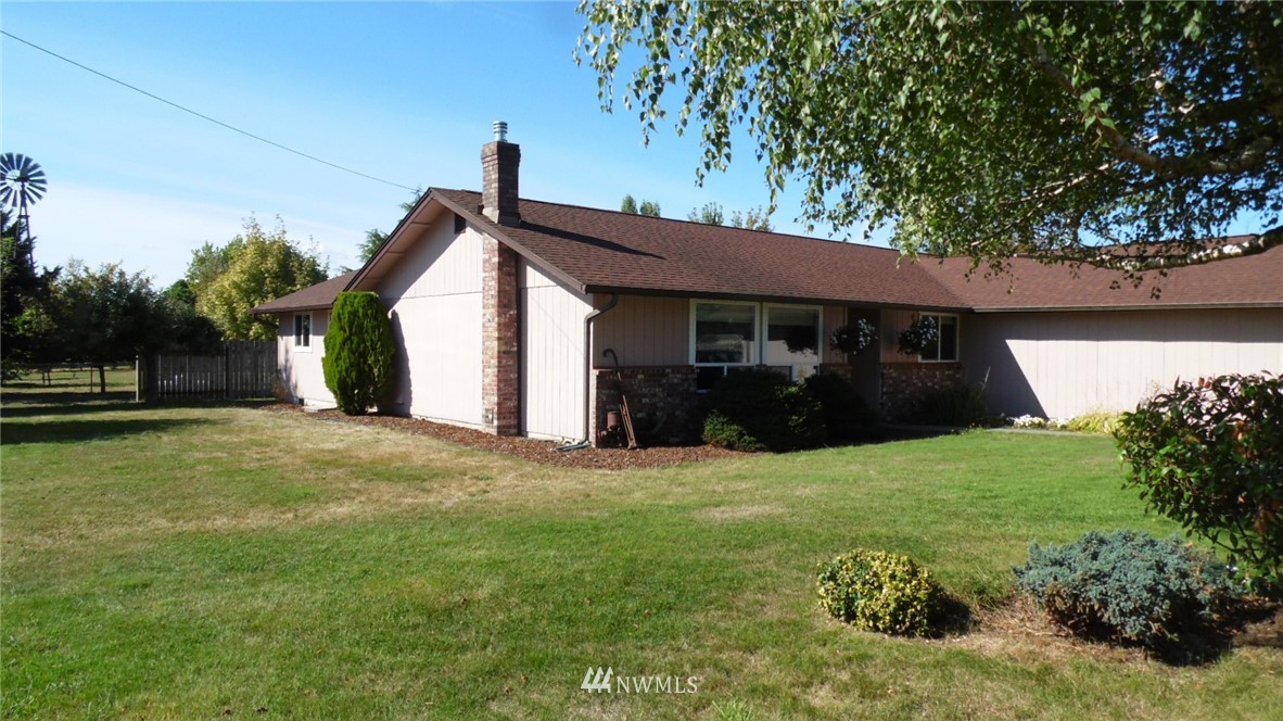 4538 180th Way Southwest Rochester, WA 98579 - Photo 16 of 25 a view of a house with backyard
