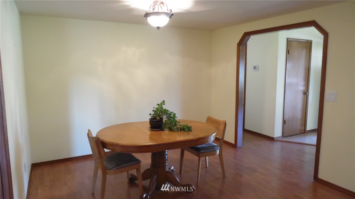 4538 180th Way Southwest Rochester, WA 98579 - Photo 9 of 25 a view of a room with a table and chairs