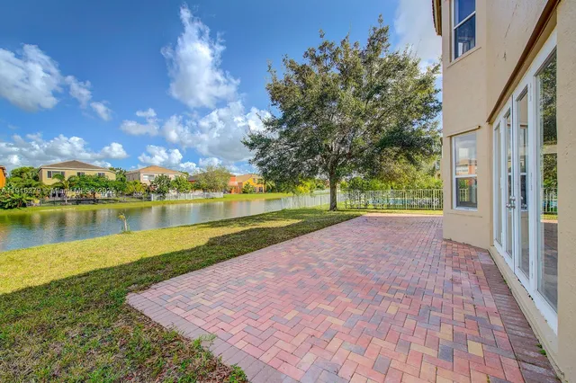 a view of a lake with a big yard