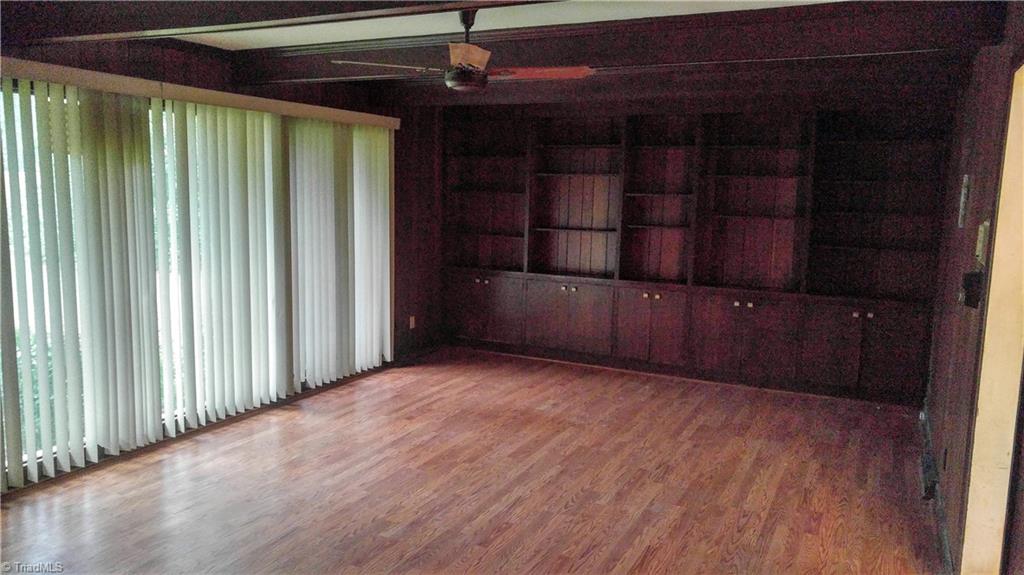 1754 Jackson Lake Road High Point, NC 27263 - Photo 11 of 30 Den with built in shelves and fireplace